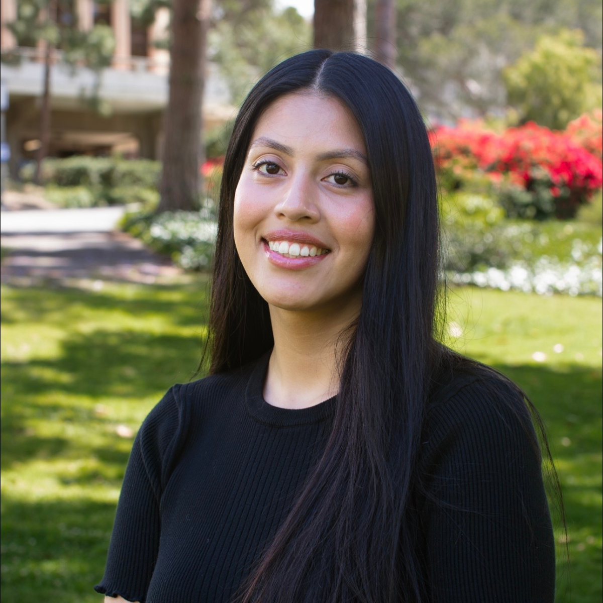 A woman wearing a black shirt.